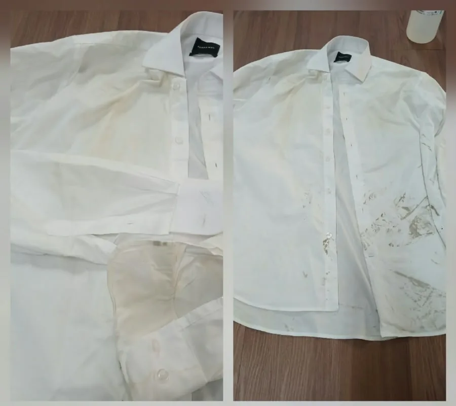 Camisa blanca manchada antes de la limpieza
